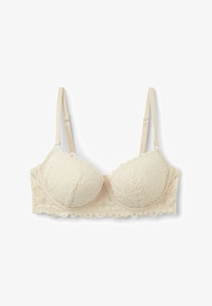 Spitzen-BH in Hellbeige mit gepolsterten Cups, gewellten Kanten und verstellbaren Trägern. Verfügt über ein florales Spitzenmuster auf der gesamten Fläche.