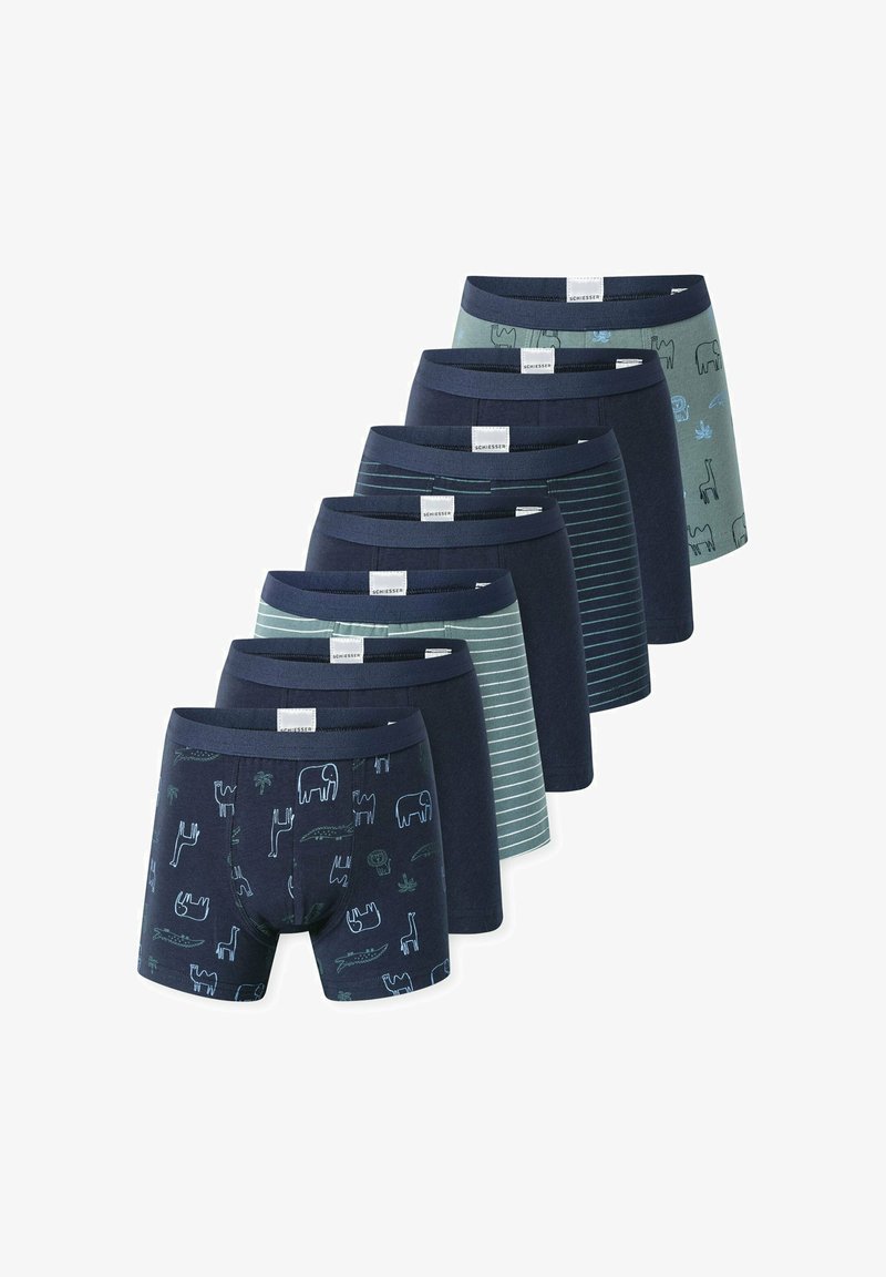 Conjunto de ocho bóxers en tonos variados de azul y verde, con patrones como animales y rayas, hechos de tela suave con cinturillas elásticas.