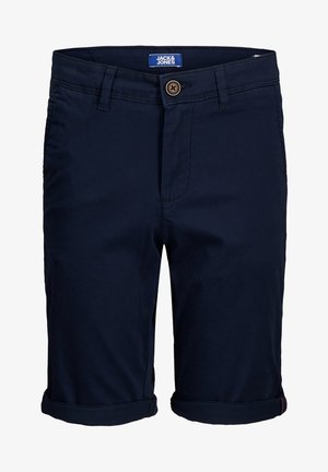 Chinos bleu marine avec un ourlet roulé, fabriqués en coton. Dotés d'une fermeture à bouton et de poches avant et arrière. Texture lisse. Étiquette de la marque visible.