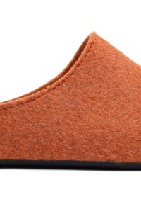 Orange felt slipper with a smooth texture, rounded design, and a black rubber sole; features a simple, minimalist aesthetic.