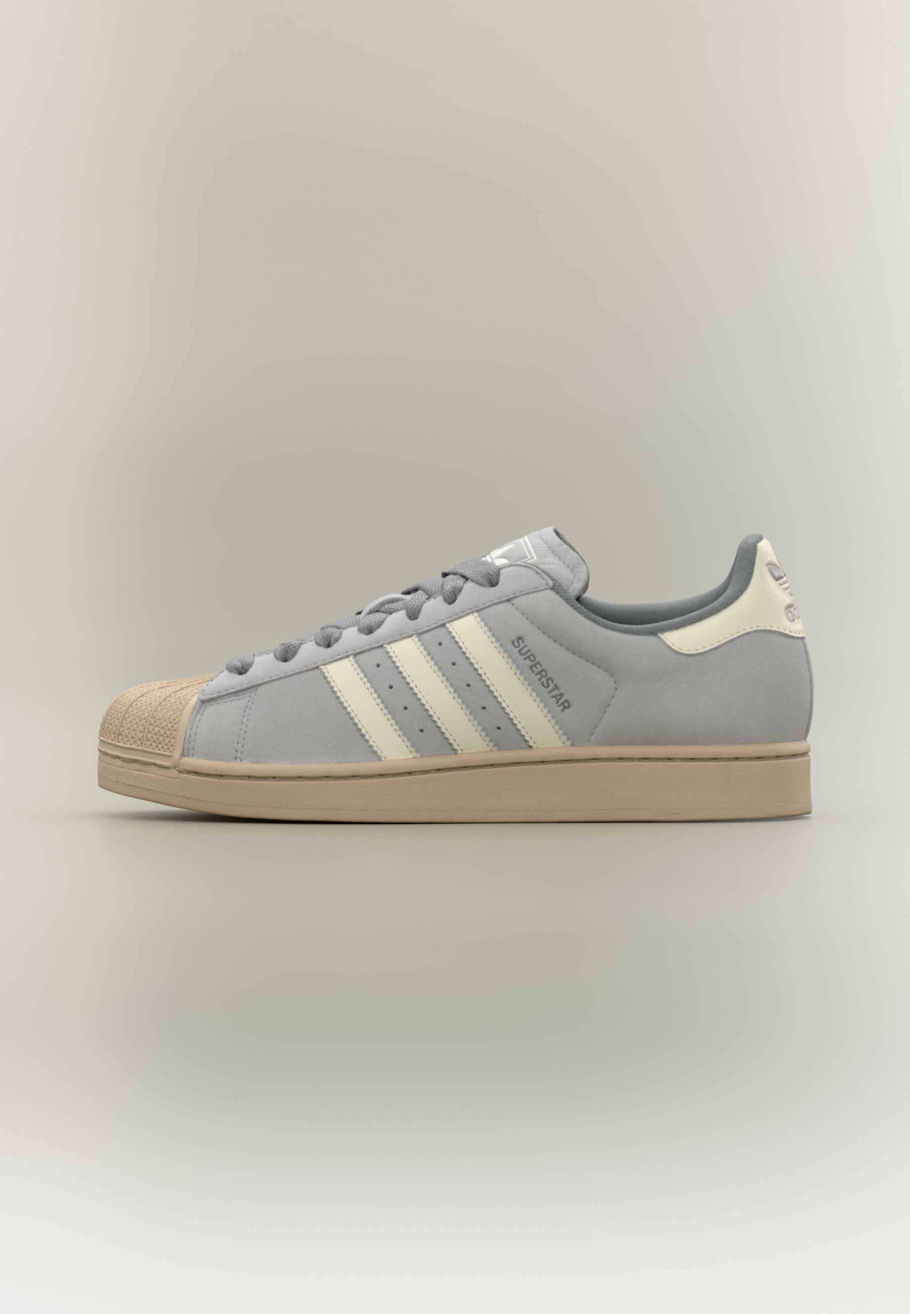 grey and white shell toe adidas
