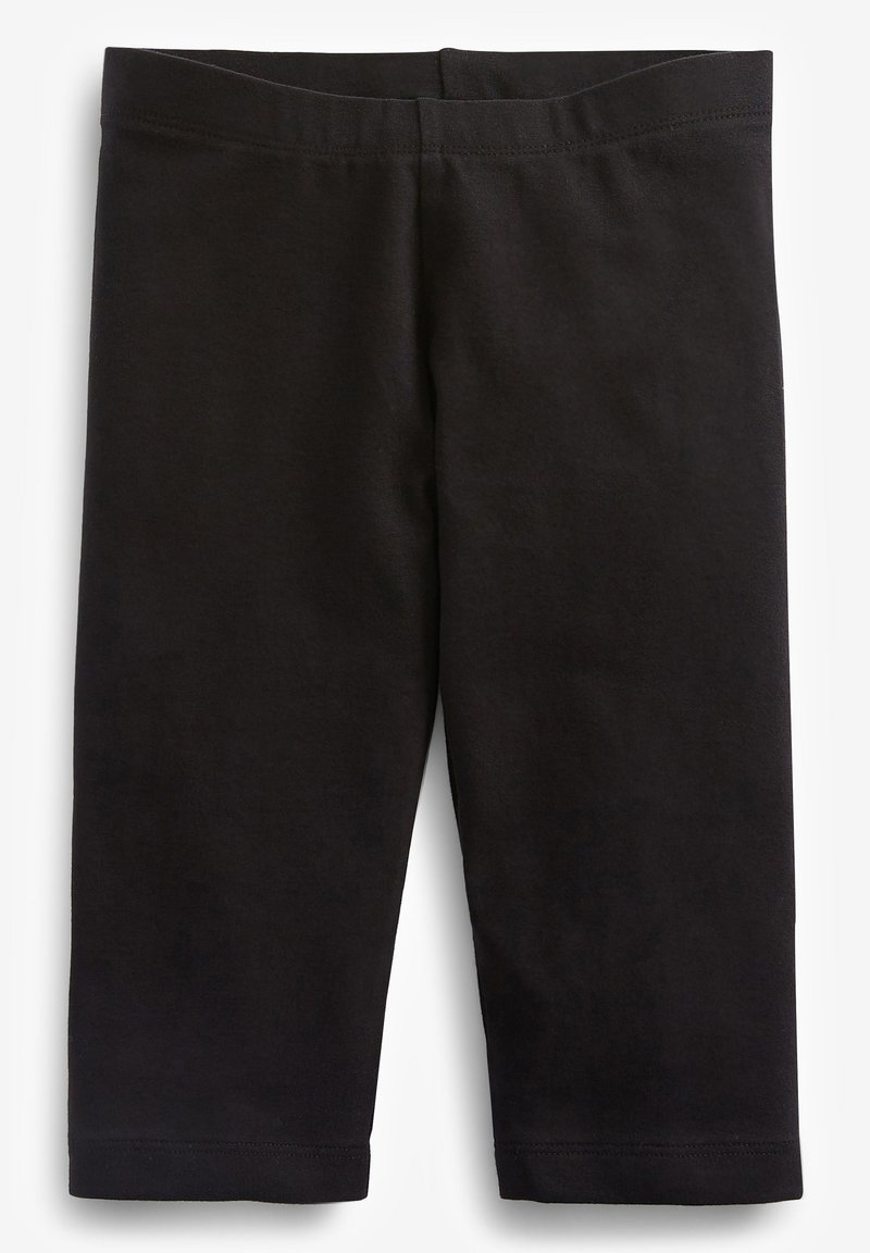 Schwarze Leggings aus weichem, dehnbarem Baumwollgewebe. Sie verfügen über einen elastischen Bund und ein eng anliegendes Design, das über dem Knöchel endet.