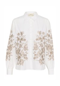 Cămașă albă cu guler, prezentând broderie florală intricate în nuanțe de bej pe mâneci. Construită din bumbac ușor, cu un guler clasic și manșete împăturite.