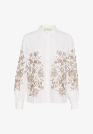 Camicia bianca con bottoni caratterizzata da un intricato ricamo floreale beige lungo le maniche. Realizzata in cotone leggero, con un colletto classico e maniche con risvolto.