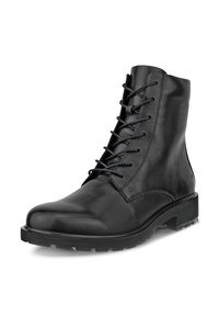 Bottine noire en cuir avec lacets, semelle épaisse et bout rond, conçue pour un usage décontracté ou formel.