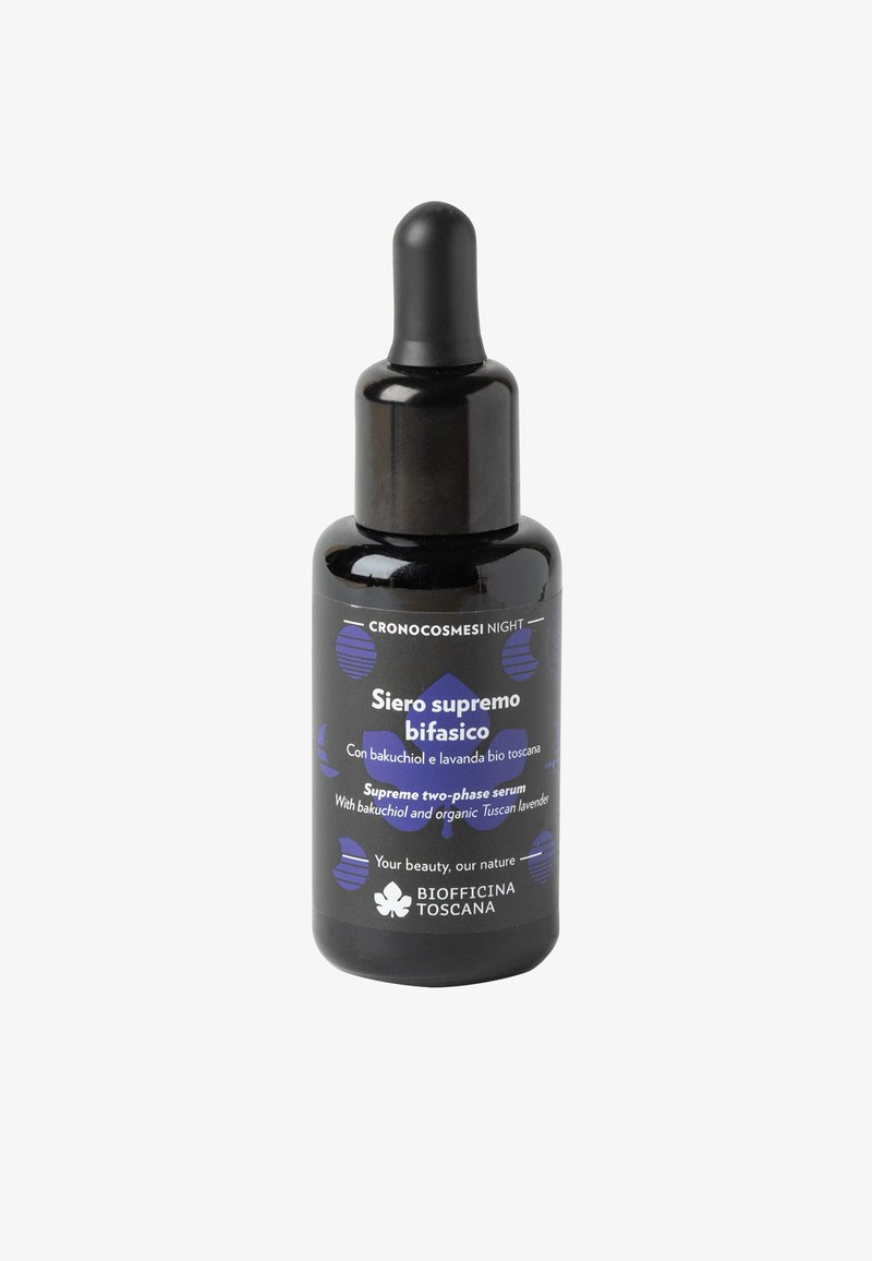 Bottiglia contagocce in vetro nero con forma arrotondata. Presenta un'etichetta blu e bianca con testo e accenti floreali. Contiene un siero bifasico.