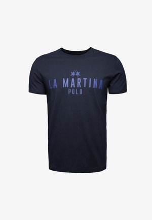 T-paita tummansinisestä puuvillasta, jossa on vaaleansiniset tekstit "LA MARTINA" ja "POLO", sekä polo-pelaajien graafinen kuva tekstin alla.