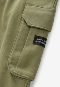 Next Tréningruha alsók - khaki green