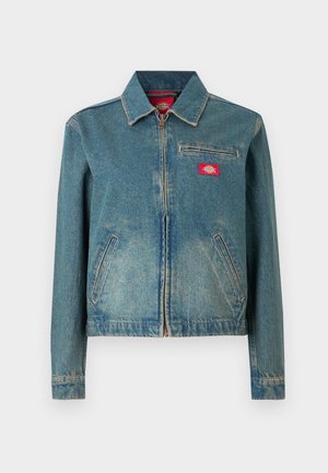 Blue denim jacket with front zipper, two front pockets, a zippered chest pocket, and a red logo patch on the chest.
