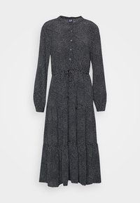 Schwarzes Langarmkleid mit weißen Polka-Punkten, geknöpftem Vorderteil, tailliertem Schnitt und gestuftem Rock. Hergestellt aus leichtem Stoff mit glatter Textur.