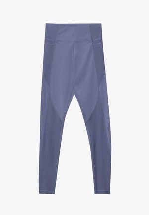 Purpurinės sportinės legginsų kelnės, kurios pasižymi prigludusia forma, lygiu paviršiumi ir tinklinėmis detalėmis šonuose, užtikrinančiomis pralaidumą orui. Aukšto liemens dizainas.