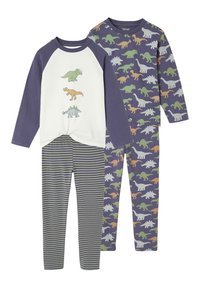 Dreiteiliges Schlafanzugset mit einem weißen und lila Oberteil mit Dinosaurier-Motiven und lila Hosen mit grünen und orangen Dinosaurier-Mustern.