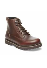 Bottines en cuir marron avec bout rond, design à lacets, surface texturée et semelle en caoutchouc robuste avec un accent beige clair contrastant.