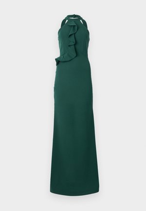 Green halter neck dress with a fitted silhouette, featuring a ruffled detail down the left side. Fabric appears smooth with a matte finish.