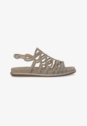Open-toe sandal in metallic taupe, featuring decorative cutouts and rhinestone accents, with a cushioned footbed and adjustable ankle strap.