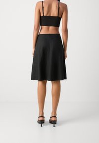 Marc O'Polo A-linjainen hame - black