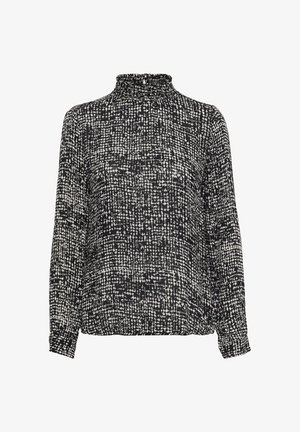 Blusa a maniche lunghe con motivo in bianco e nero, colletto alto e arricciato, e polsini elasticizzati. Tessuto morbido con un aspetto texture.