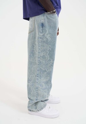 LASER ETCHED DRAGON REPEAT  - Relaxed fit jeans - bleach
