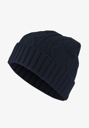 Bonnet tricoté bleu marine avec une texture côtelée et un motif en losanges. Le design présente un ajustement serré et un bord replié en bas.