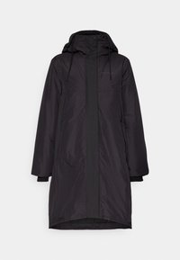 Parka longue noire avec capuche, dotée de panneaux contrastants, fermeture éclair et poignets élastiques pour un ajustement parfait. Tissu lisse et résistant à l'eau.