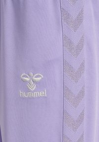 Hummel JOGGERS - Träningsbyxor - lavender