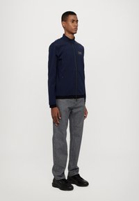 EA7 Emporio Armani Lengva striukė - blue