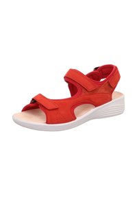 Czerwona zamszowa sandałka z odkrytymi palcami i regulowanymi paskami na rzepy. Biała gumowa podeszwa z fakturą i przewiewnymi wycięciami.