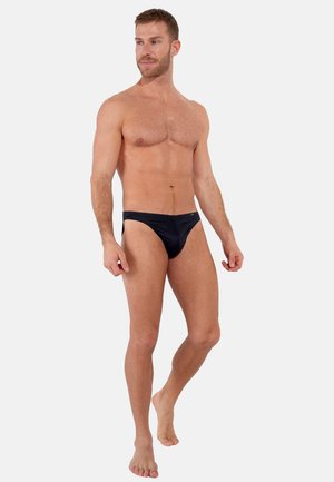 Slip da nuoto neri con una trama liscia, caratterizzati da un design a vita bassa e copertura minimale, adatti per attività acquatiche.