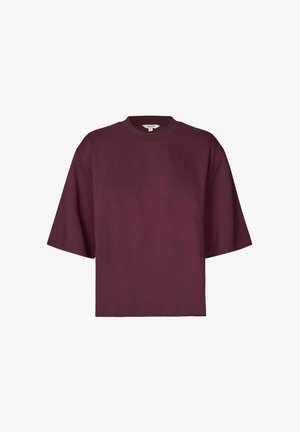 Bordeauxfarbenes Oversized-T-Shirt, runder Ausschnitt, kurze Ärmel, aus glattem Baumwoll-Mischgewebe. Einfaches Design ohne Muster oder Akzente.
