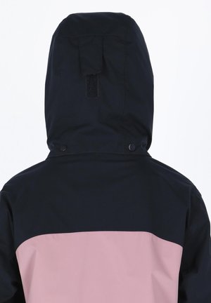 Hooded jacket featuring a navy upper section and a pink lower section. Made of smooth, waterproof fabric with snap buttons and a velcro flap.