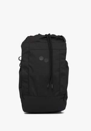Schwarzer Kordelzug-Rucksack mit strukturiertem Äußeren, zwei runden Akzenten und einer Fronttasche. Verfügt über eine elegante, zylindrische Form.
