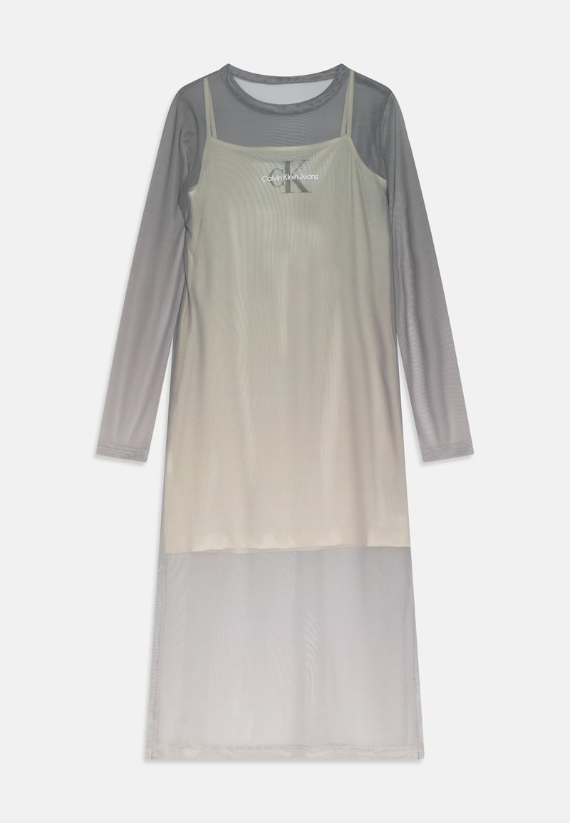 Pikendusega kleit, millel on poolläbipaistev hall ülaosa ja heledast hallist siledast riidest seelik, valmistatud võrkkangast. Keskosas on logo "Calvin Klein Jeans."