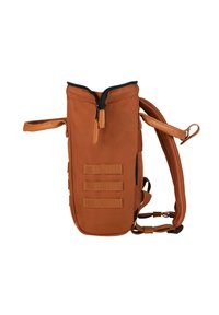 Brown canvas backpack with a zippered top, padded shoulder straps, and three horizontal webbing straps on the front for attachment.