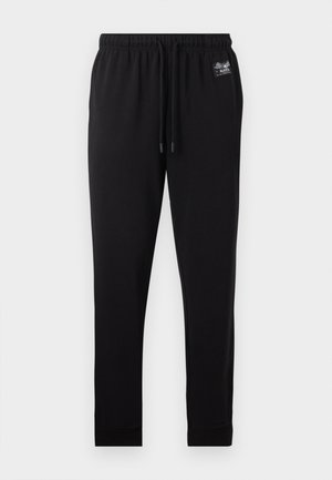 Von Dutch, PEACHED WITH BACK PRINT AND RHINESTONES - Pantalon de survêtement - black