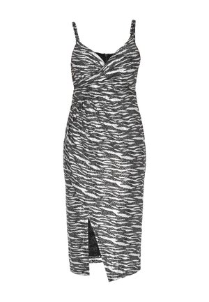 Sort-hvid stribet kjole med zebramønster, tætsiddende silhuet, justerbare stropper, indpakket bodice og en frontslids. Fremstillet af et glat stof.