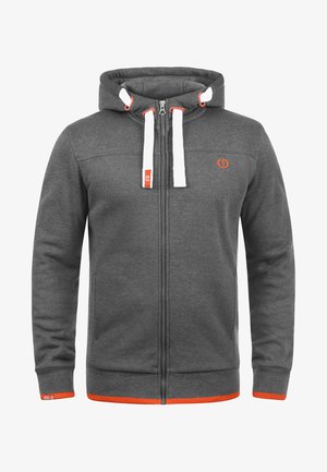 Szara bluza z kapturem na zamek błyskawiczny, z podszewką w kapturze, białymi sznurkami, pomarańczowymi akcentami, bocznymi kieszeniami oraz ściągaczami przy rękawach, wykonana z mieszanki bawełny.