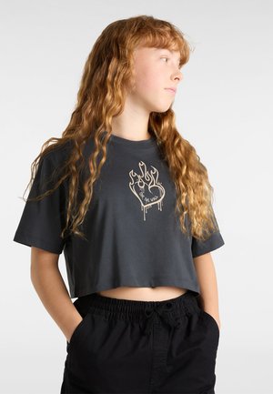 Klippt svart t-shirt i bomull med korta ärmar, med ett guldflame-design som har en hjärtformad kontur och droppande detaljer.