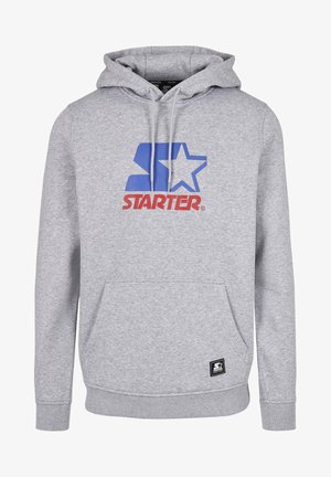 Šedá mikina vyrobená z jemnej látky, na ktorej je veľké modro-červené logo "STARTER". Má predné vrecko a kapucňu so sťahovacou šnúrkou.