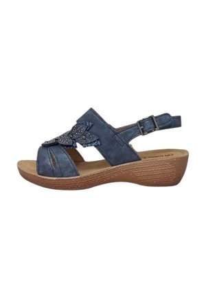 Sandal blu in suede con punta aperta, design a intaglio, fiocco decorativo e strass. Dotato di cinturino alla caviglia regolabile e suola marrone texture.