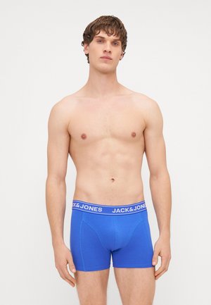 Boxer-briefs bleus en tissu extensible, dotés d'un design ajusté et d'une taille douce avec le logo "JACK & JONES" en blanc.