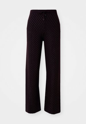 Mörklila loungebyxor med dragsko i midjan, med ett prickmönster av små vita prickar, vida ben och mjuk tygtextur.