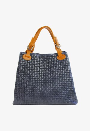 Dark blue woven leather handbag with two tan leather handles featuring silver buckle details, shown against white background.