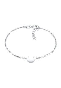 Silverfärgad kedjebranslet med en månformad berlock. Har en kräftklämma och en förlängningskedja för justerbar längd.