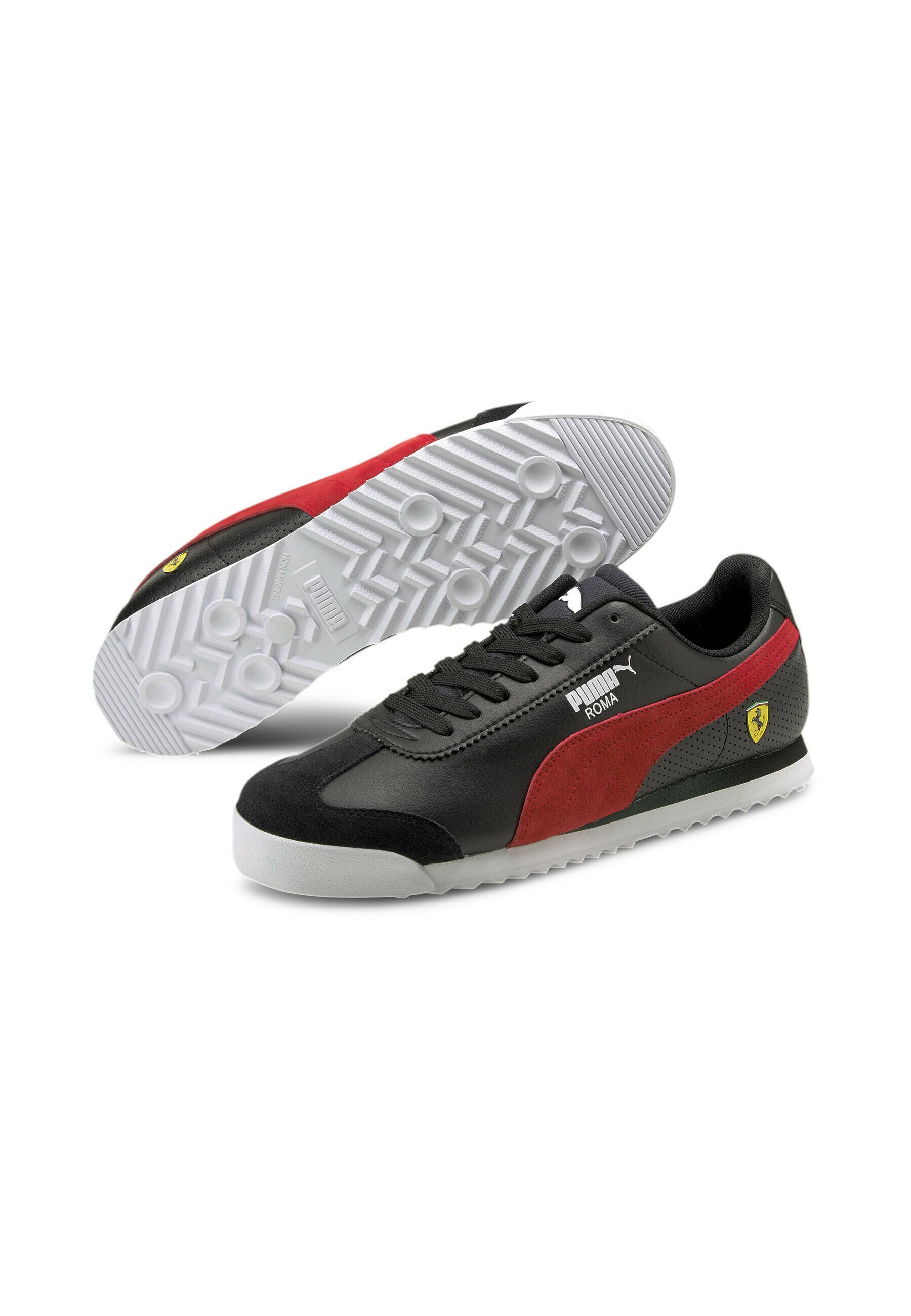 black puma roma trainers