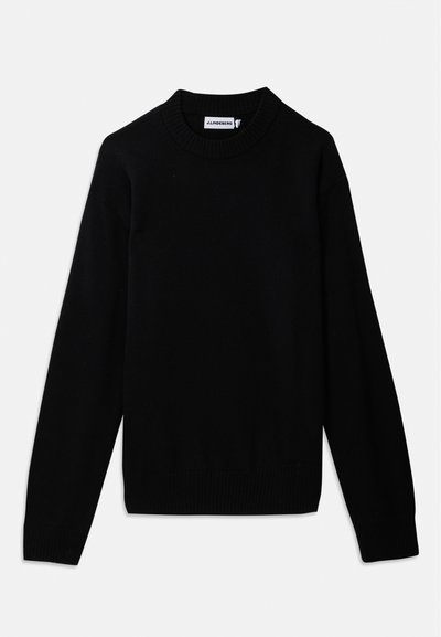 Svart tröja med ribbad rund halsringning, långa ärmar och ett strukturerat stickmönster. Inga synliga logotyper eller utsmyckningar.