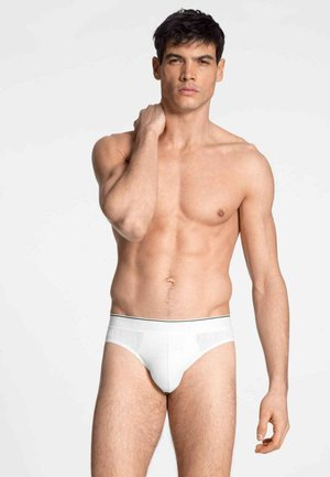 Weißes Herrenunterwäsche aus glattem Material mit einem kontrastierenden schwarzen Bündchen. Das Design verfügt über eine körpernahe Passform und einen minimalistischen Stil.