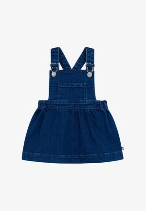 Vestito salopette in denim, blu scuro, con bretelle regolabili, tasca frontale e gonna arricciata. Tessuto liscio, orlo rifinito, dettagli in metallo argentato.