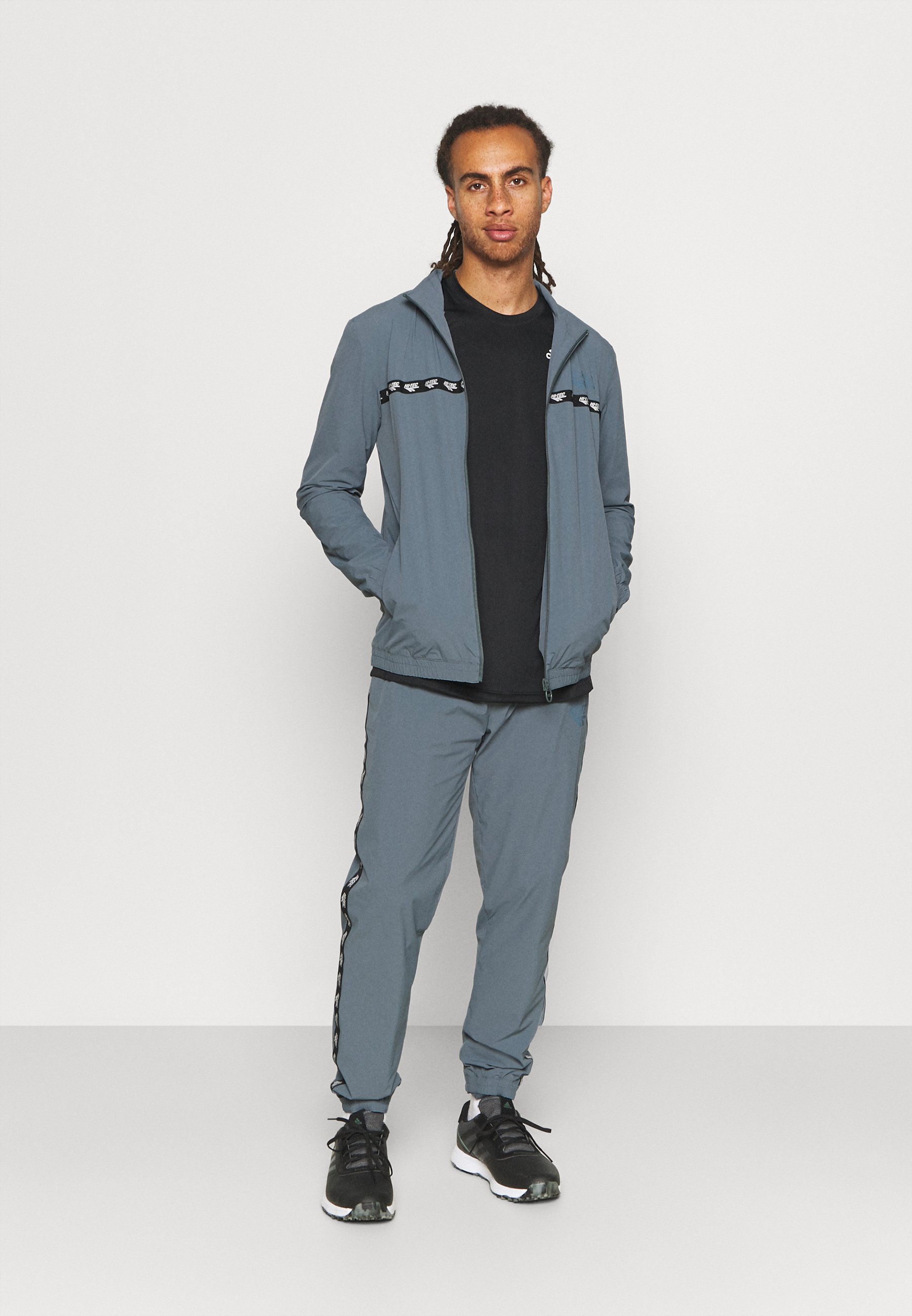 Hi-Tec HANNES TAPE TRACKSUIT - Tuta - stormy weather/blu scuro - Zalando.it