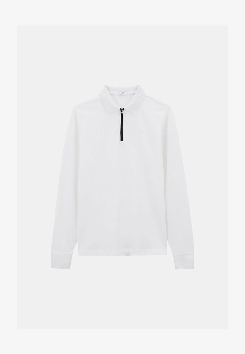 Polo-shirt à manches longues blanc avec col, fermeture éclair à mi-hauteur à l'avant et zip noir. Tissu lisse avec un design minimaliste.