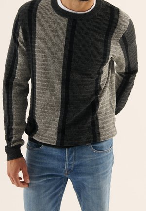 Stickad tröja - mottled grey